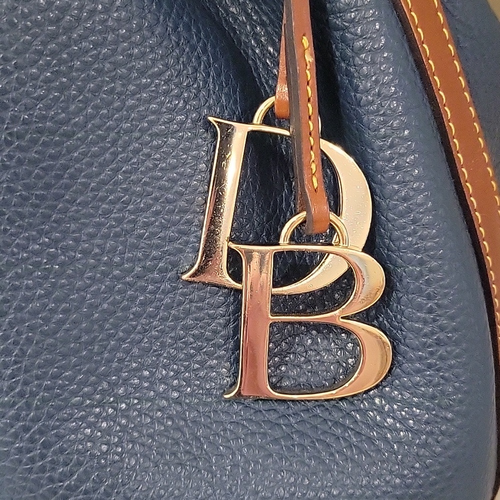 Dooney & Bourke Pebbled Leather Drawstring Bucket Bag With Gold Hardware & Charm - Picture 2 of 16